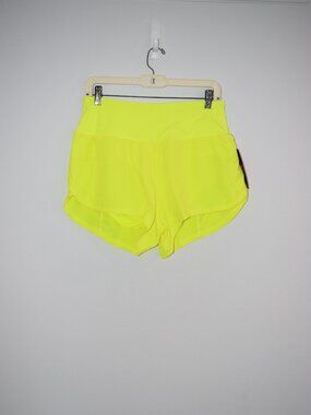 NWT Neon Yellow lined running shorts.  TGP The Gym People size Large